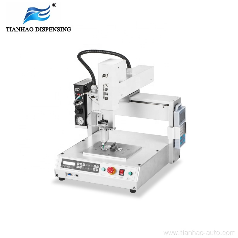 Benchtop robot with syringe micro dispensing