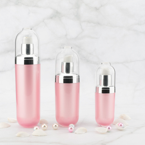 Bouteille cosmétique ronde en acrylique rose avec bouchons ARGENT