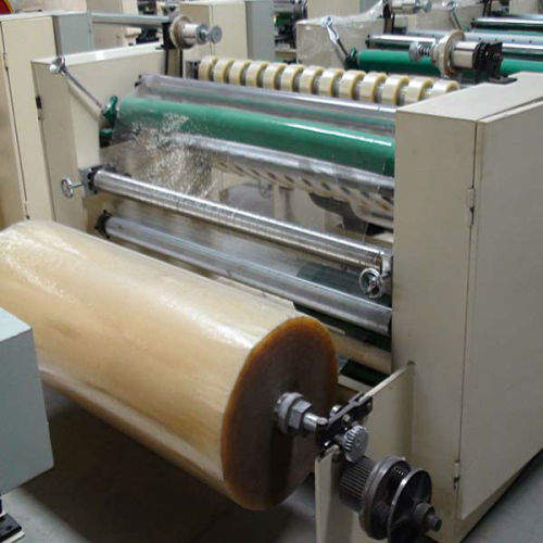adhesive tape slitter and rewinder
