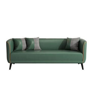 Modern Green Leather Sofa with Houndstooth Accent Pillows