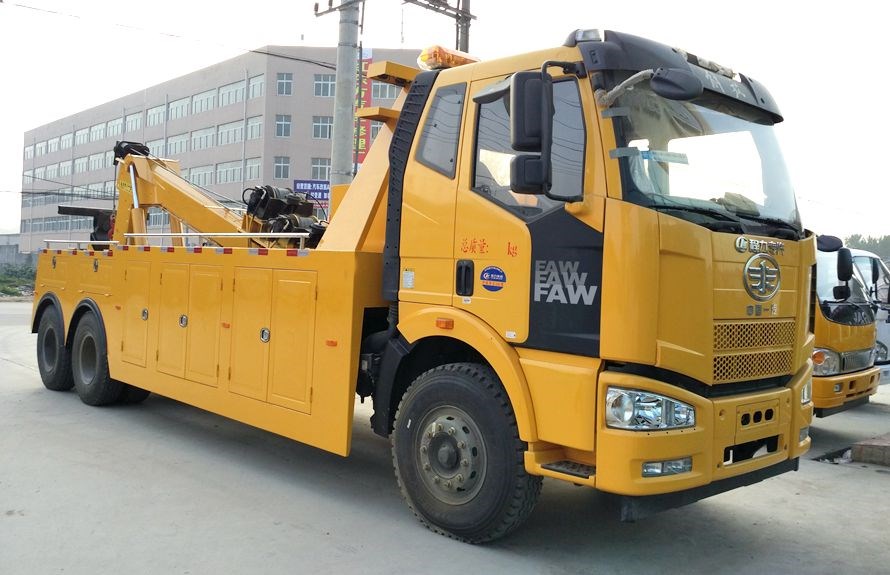 garbage trucks towing vehicles