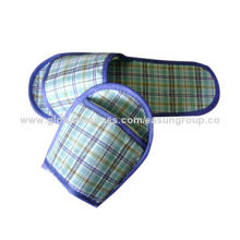 Disposable airline slippers with label logo