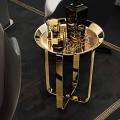 Desain Minimalis Minimalis Titanium Gold Home Gunakan meja kopi dengan ukuran berbeda