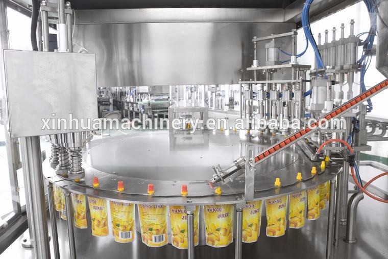 Automatic stand pouch spout pouch filling and packing machine capping machine