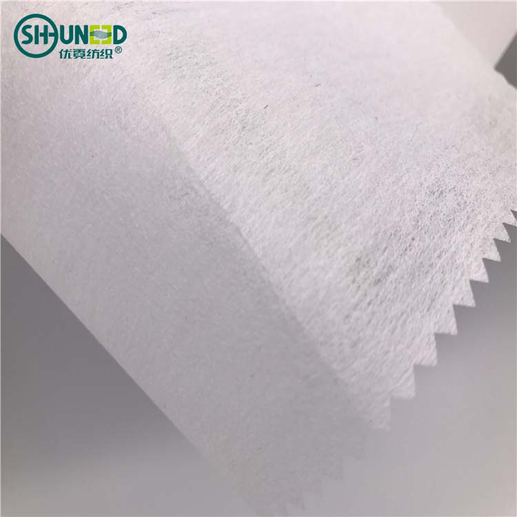 Chinese hot sell SGS high quality 100% polyester LDPE fusible cut away embroidery backing paper soft garment nonwoven fabric