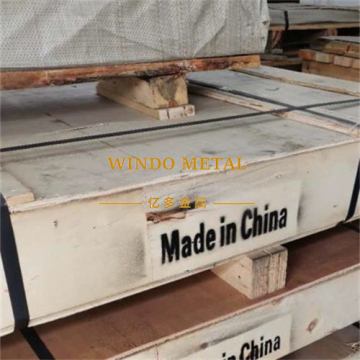 Architectural column cladding with brass plate