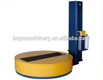 roll stretch wrapper with pushing up device