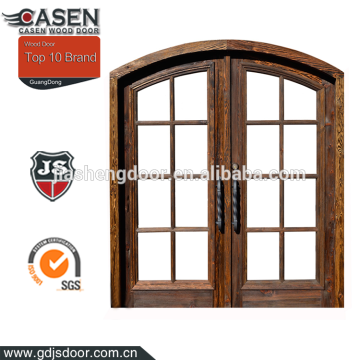 rustic glazed knotty pine wood arched french doors interior