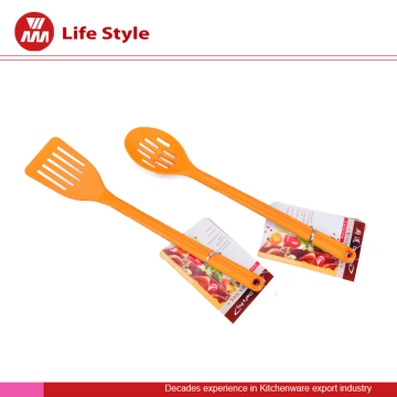 colorful kitchenware slotted spoon and soup ladle