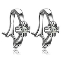 Sterling silver hoop earrings with large shinning diamond