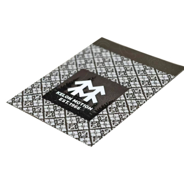 Patterned woven base with silicone printing label