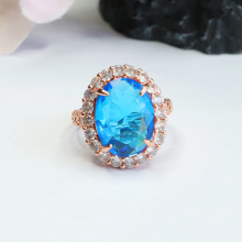 Wholesale Blue Cubic Zirconia, Crystal, and Topaz Rings with Colored Glaze and Faceted Shapes