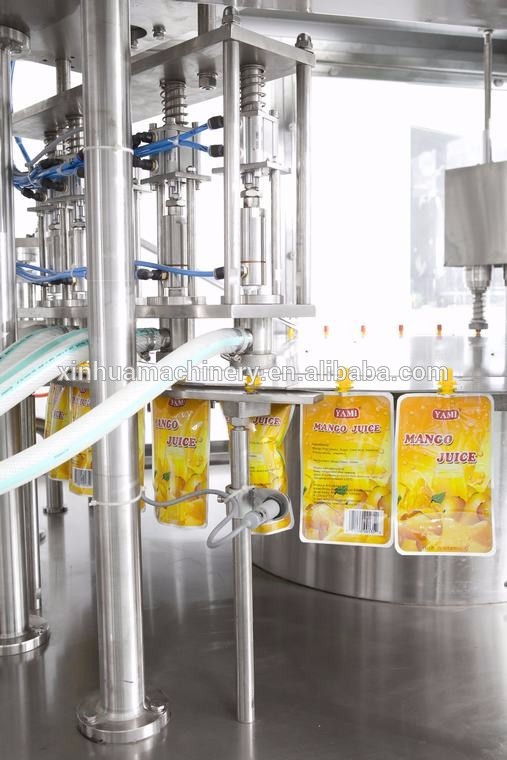 Automatic stand pouch spout pouch filling and packing machine capping machine