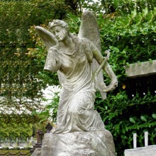 Famous stone portrait Brompton angel with harp cemetery monuments statue