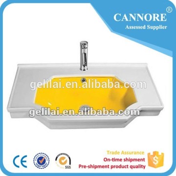 Colored ceramic cabinet basin