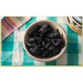 a Healthy Food with peeled Black Garlic