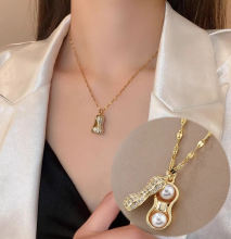 Pearl Necklace with Peanut Pendant Titanium Wave Chain