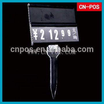 price tickets retail in display hooks in supermarket