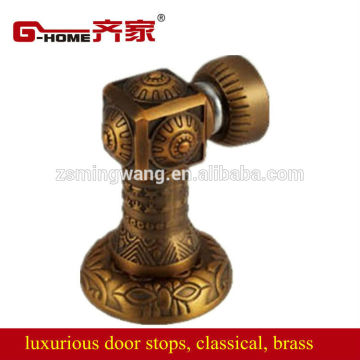 elegant brass door stoppers