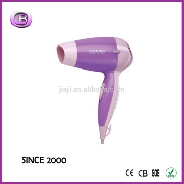 houseware drying hair with hair dryer