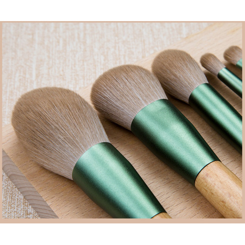 juegos de pinceles de maquillaje con mango de color madera verde leve