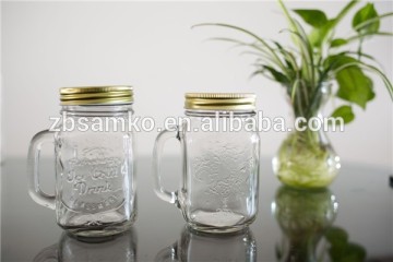 Square glass mason jar with embossment and golden lid