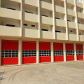 High speed vertical sectional door