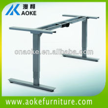Electric height adjustable desks and desk frames