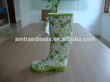 Green patter rubber rain boots