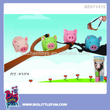 Plastic slingshot toy pig