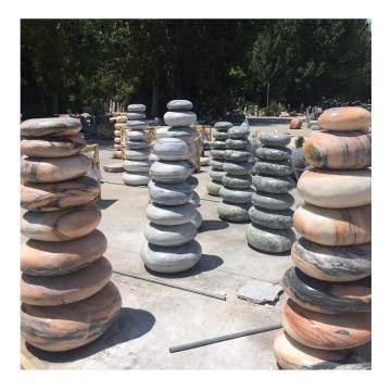 Round Rock Garden Landscaping with Oversized Pebbles