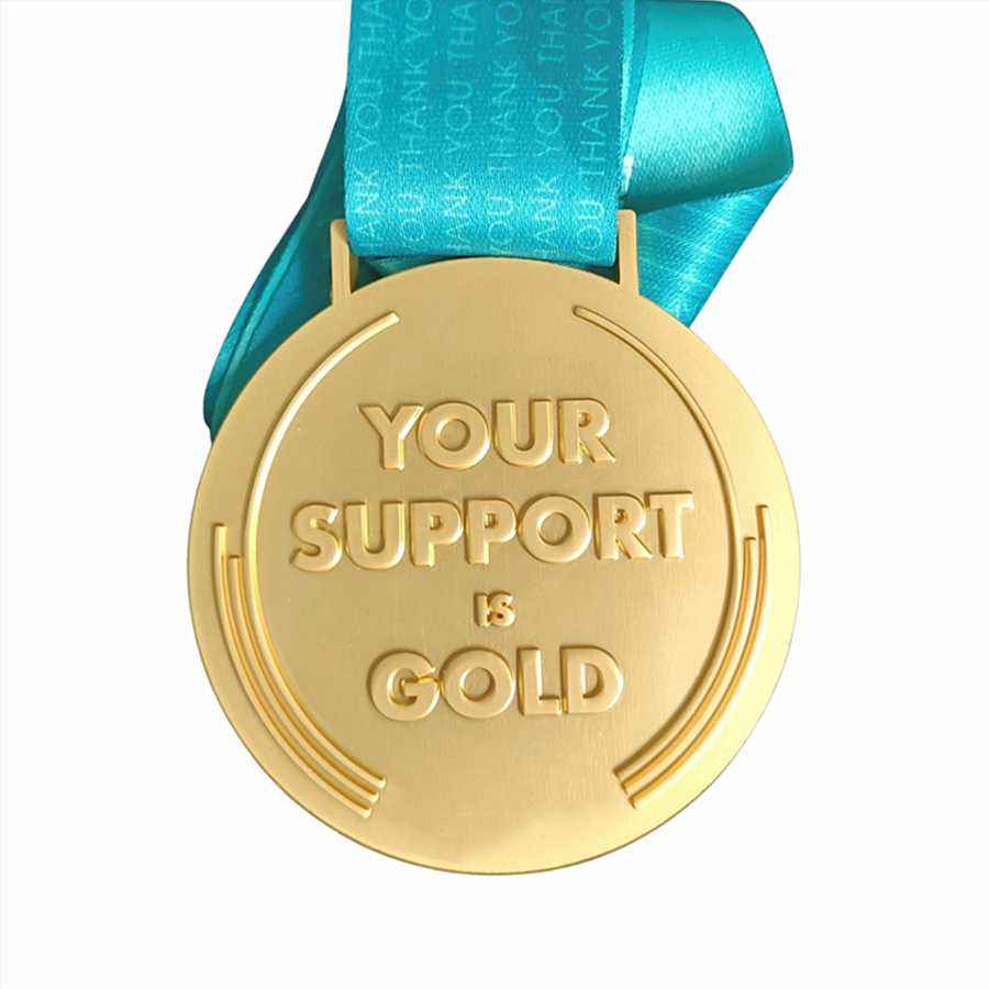 Raised gold logo metal medal with ribbon