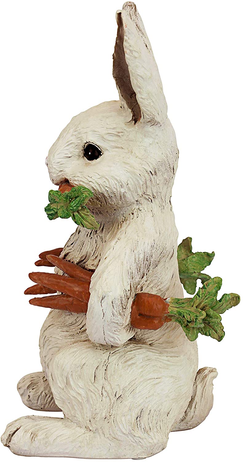 Le lapin avec décor de Pâques de carottes