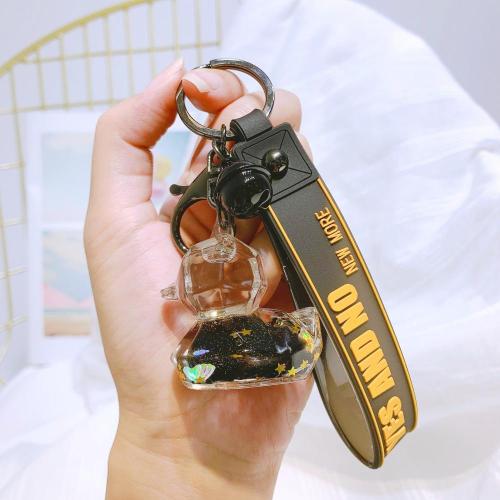 Black Gold Astronaut Floating Bottle Keychain