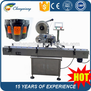 2015 hot automatic adhesive labeling machine for bag,labeling machine bag,coffee bag labeling machine