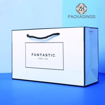 White shopping paper bag with custom logo