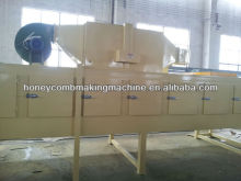Vertical corrugated paper panel machine