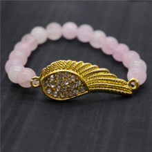 Pulsera de piedras preciosas elástica y cuentas redondas de cuarzo rosa de 8 mm con pieza de ala de diamante