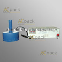 Hand operated cap sealing machine