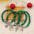 Bracelet en malachite naturelle avec pendentifs en alliage