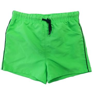 กางเกงขาสั้นว่ายน้ำของเด็กชายสีเขียวฟลูออเรส