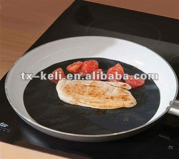PTFE non-stick and reusable frying pan sheet can be clipped as per your pan size