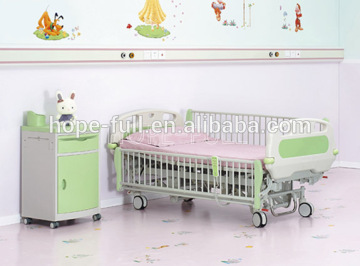 Children using hospital bed