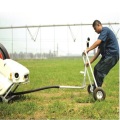 Small reel sprinkler with long life and reduced crop damage 50-90