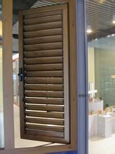 Commercial exterior window designer art glass window shutters panel