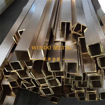 Extruded brass guide rails for industrial equipment