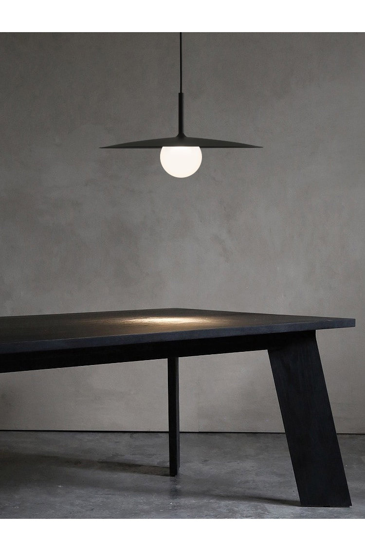 It features a round disc-shaped lamp shade made of glass, which adds a touch of elegance to the design. It features a round disc-shaped lamp shade made of glass, which adds a touch of elegance to the design.