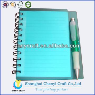 Spiral notebook with ball pen