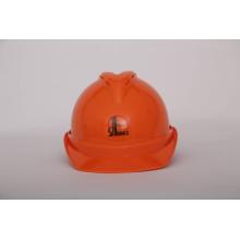 Orange construction site safety helmet