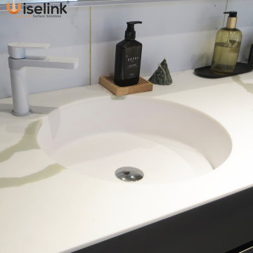 round solid surface under mounted basin